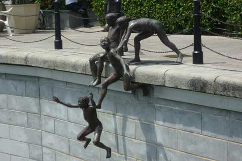 Antique Bronze Naughty Boys Sculpture Beside River