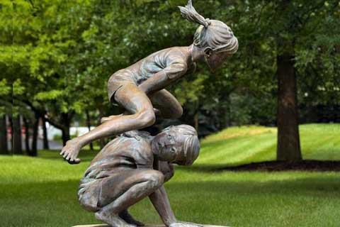 Antique Bronze Two Kids Playing on Lawn Statue for Sale