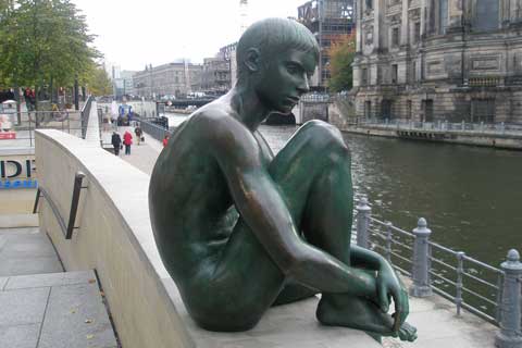 Bronze Sculpture Quiet Boy Near the River